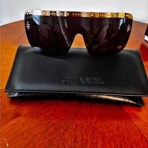 CHANEL Black Sunglasses with Gold Accents